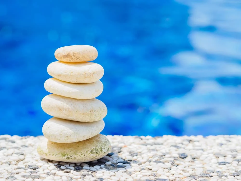 pool deck material white pebble stone
