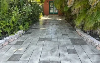 dark gray geometrical stamped concrete walkway