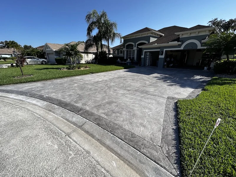 gray concrete stamped driveway Driveway Resurfacing