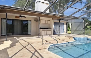 Renovated Poolside Area With Decorative Concrete