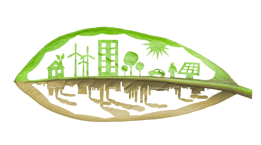 Green ecology city against pollution concept, isolated over whit Green ecology city against pollution concept, isolated over white