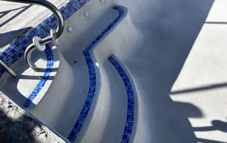 Pool Steps Detailing with Decorative Mosaic Tiles