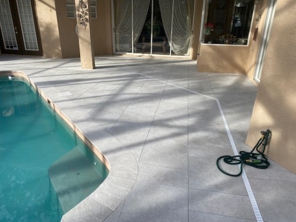 Sleek Porcelain Pavers Installation Around Pool Sleek Porcelain Pavers Installation Around Pool