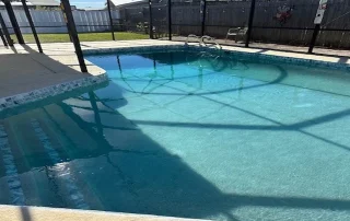 Serene Poolside Shadows Concrete Deck
