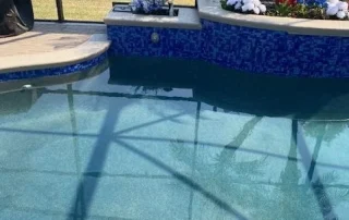finished pool resurfacing blue tiles