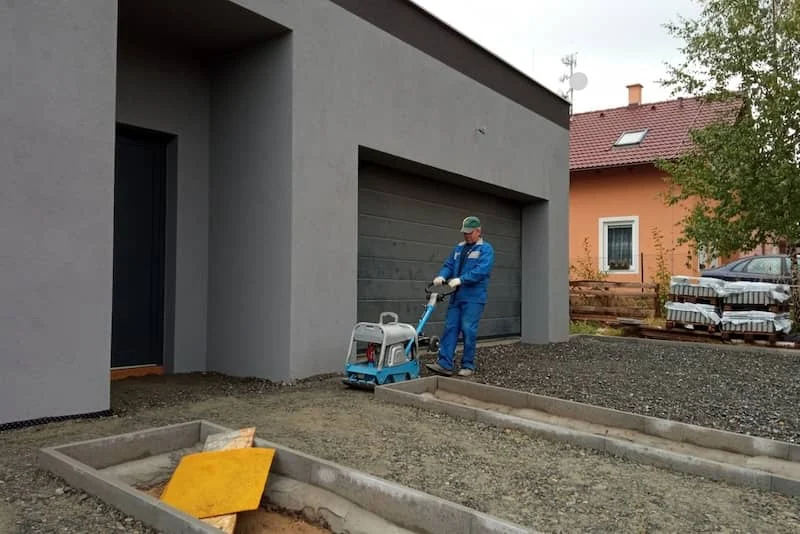 man working on driveway resurfacing man working on driveway resurfacing